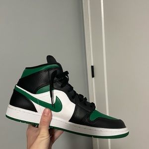 Nike Christmas Jordan 1 Mid. Men’s size 11. Does not come with original box.